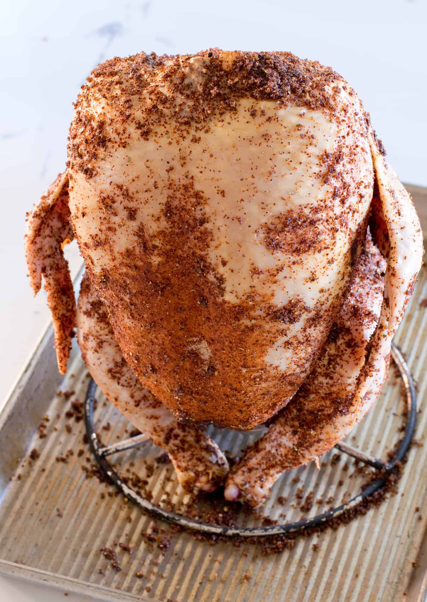 Awesome beer can chicken seasoned and ready to go on the grill
