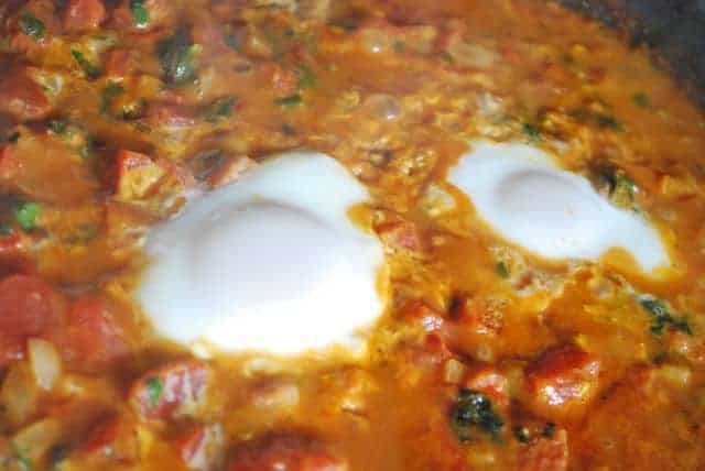 Eggs Poached in a Curried Tomato Sauce