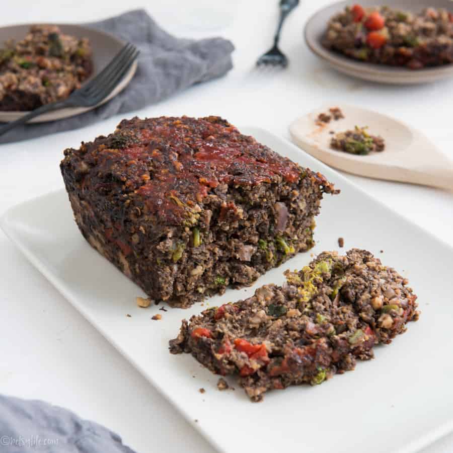 Meatless Meatloaf sliced on a rectangular white plate