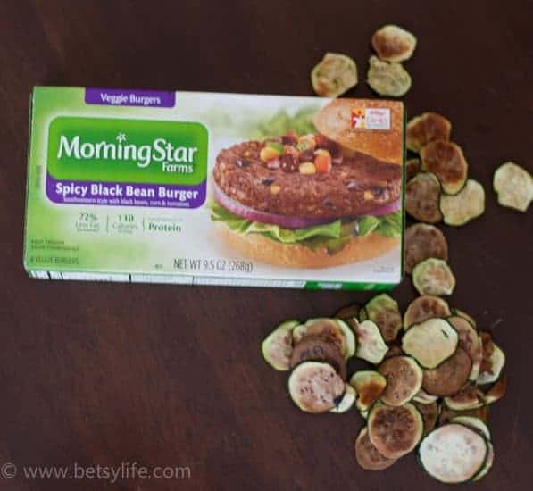 box of morningstar black bean burgers with zucchini slices