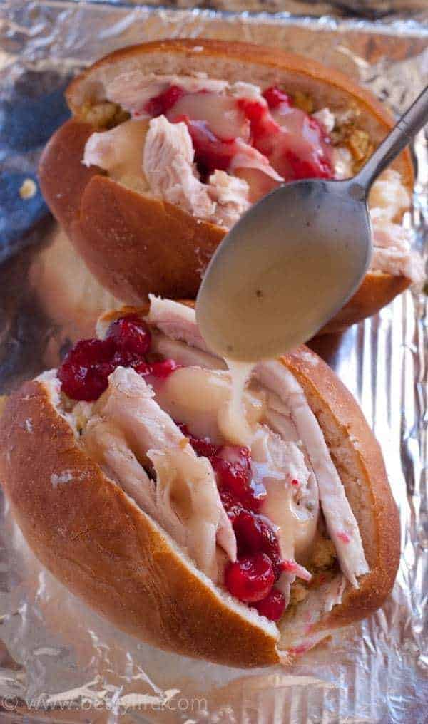Crispy, gooey, cheesy. These Thanksgiving Leftovers Stuffed Sandwich Rolls are the ultimate way to enjoy your leftovers. | Betsylife.com 
