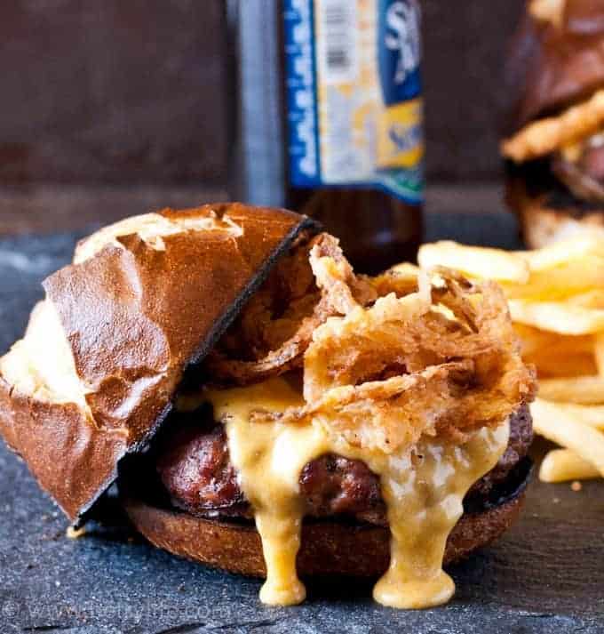 burger with crispy onions oozing cheese