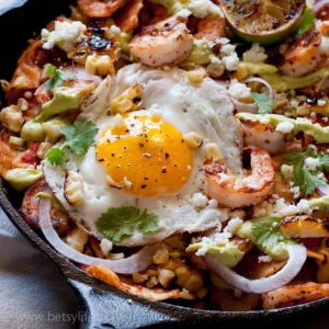 Shrimp and Grilled Corn Chilaquiles with Avocado Cream Sauce Recipe. Great for breakfast, a snack or any time of the day.