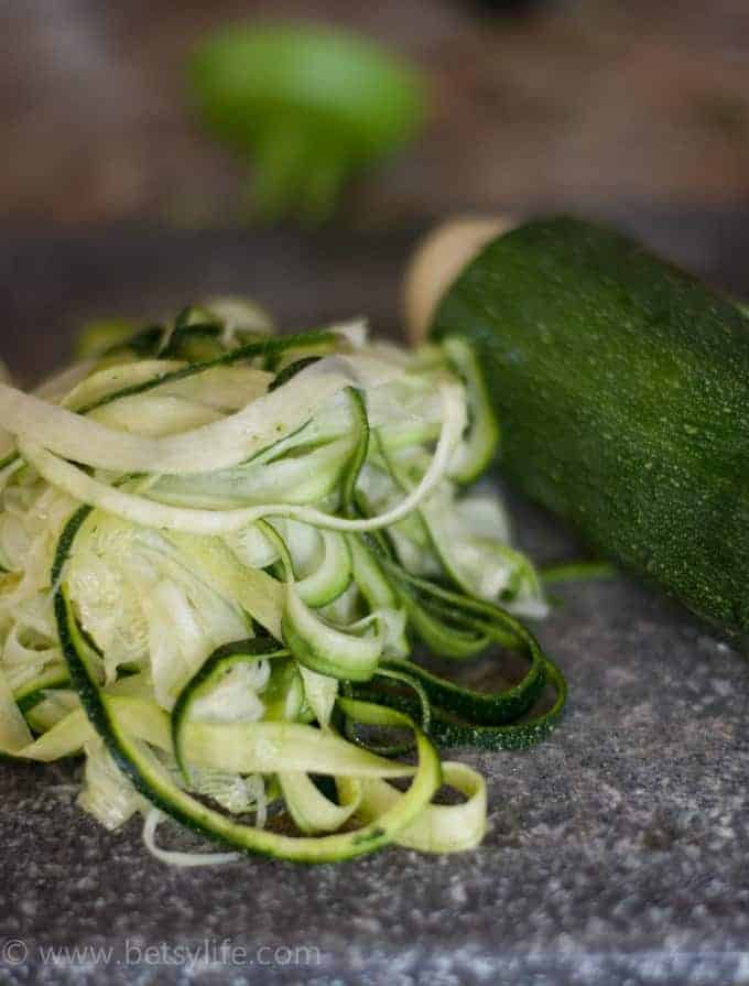pile of freshly spiraled zucchini noodles 
