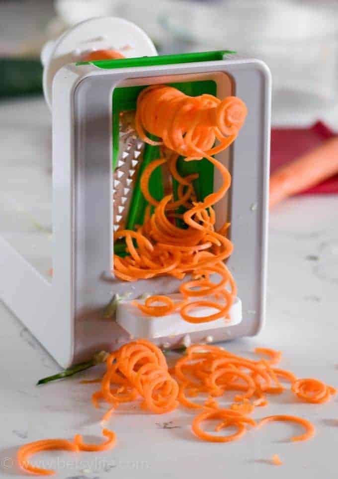 Vegetable spiralizer with a carrot being spiralized