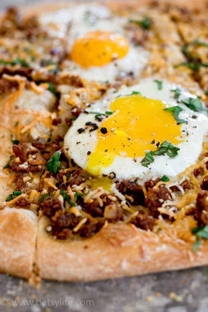 runny egg on a pizza