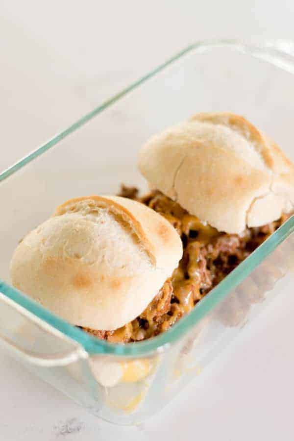 two oven baked sloppy joes in a glass dish