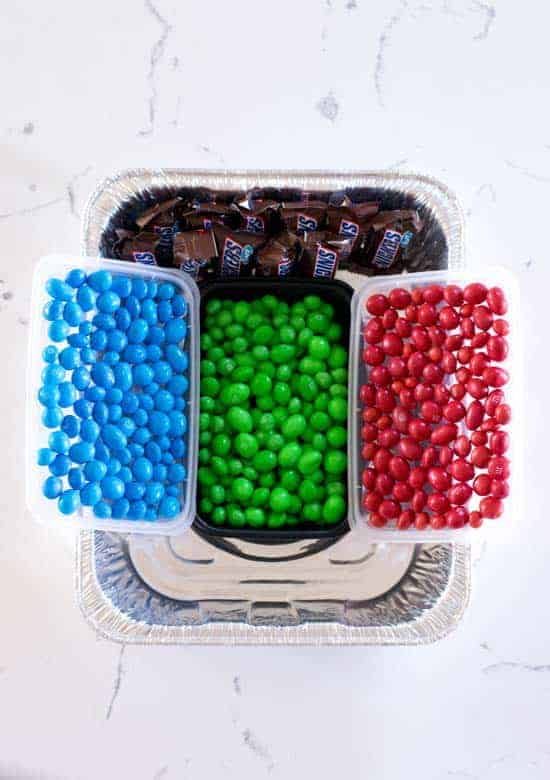 halfway built snack stadium with m&ms and snickers 