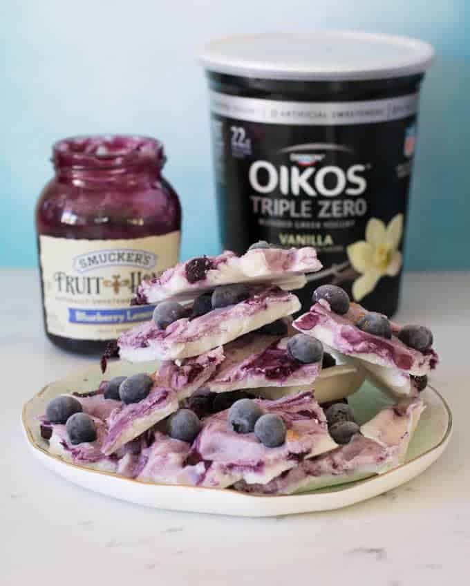 Blueberry Frozen Yogurt Bark with jar of jam and carton of yogurt