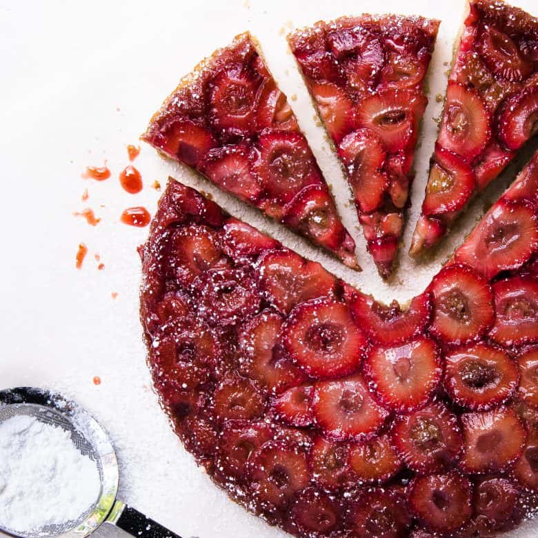 strawberry upside down cake cut into triangle slices